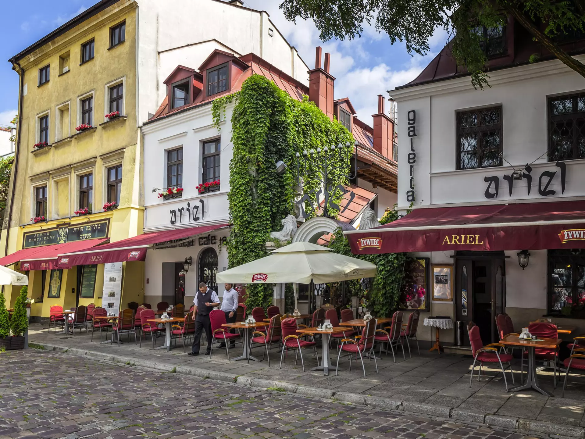 Jewish restaurant and cafe pub on a cobbled street in the Kazimierz district in Krakow, Poland