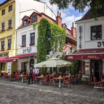 Jewish restaurant and cafe pub on a cobbled street in the Kazimierz district in Krakow, Poland