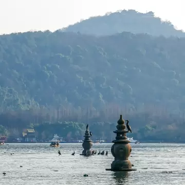 Landscape of Sanpan pagoda atThree pools mirroring the moon,located at Xihu(west lake)in hangzhou city,china, License Type: media, Download Time: 2026-08-31T22:40:29.000Z, User: LP_NZhan, Editorial: false, purchase_order: 65050 - Digital Destinations and Articles, job: App Content, client: Lonely Planet App, other: Nadine Zhan