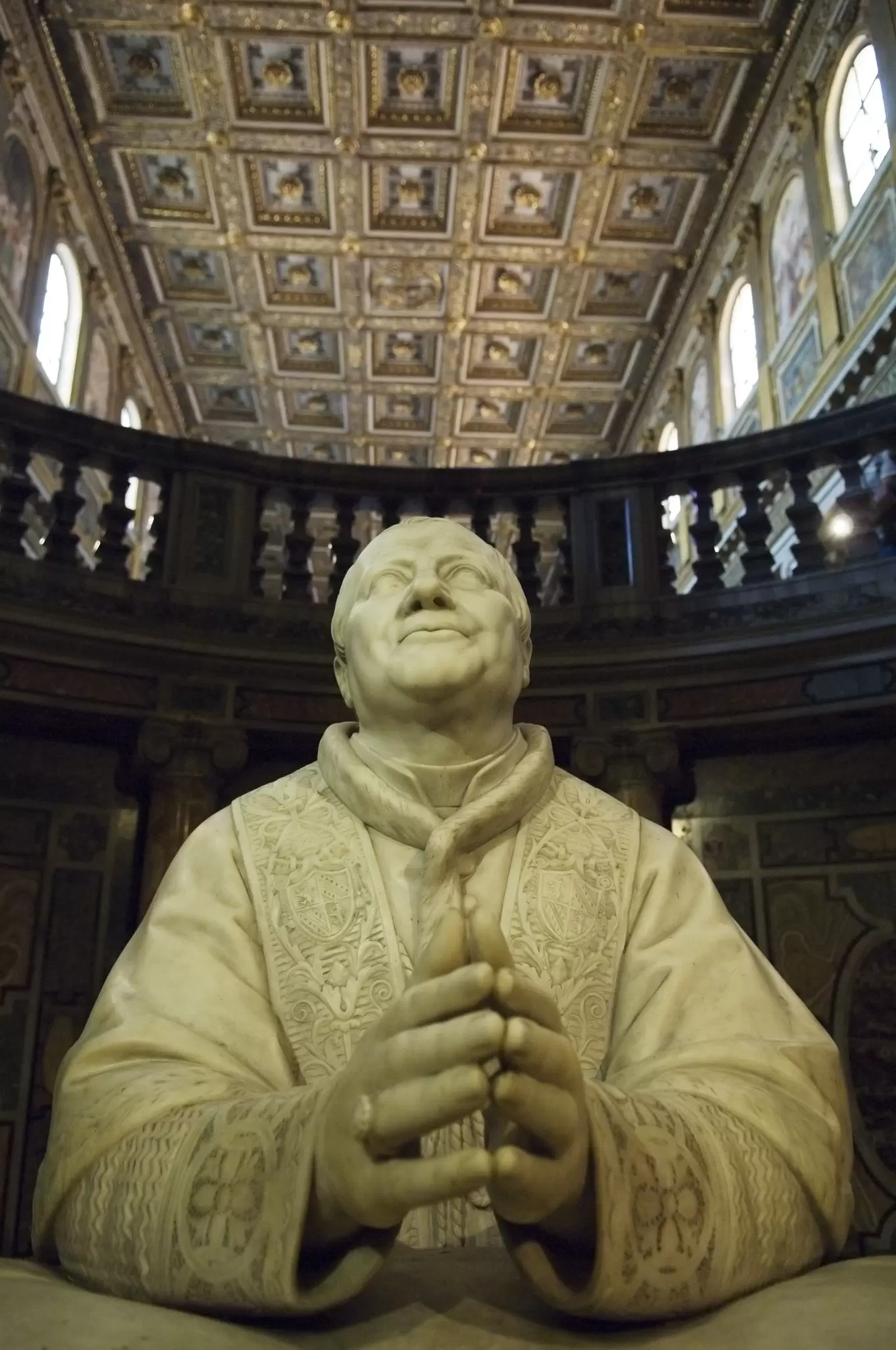 Statue of Pope Pius IX kneeling in the Crypt of the Nativity at Basilica di Santa Maria Maggiore in Rome, Italy.