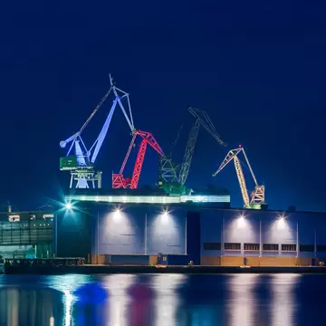 Giant cranes at shipyard at night covered in light in 'Pula', License Type: media, Download Time: 2026-02-23T00:05:59.000Z, User: LP_YKhanna, Editorial: false, purchase_order: 65050 - Digital Destinations and Articles, job: LP, client: App Content, other: Yuvraj Khanna