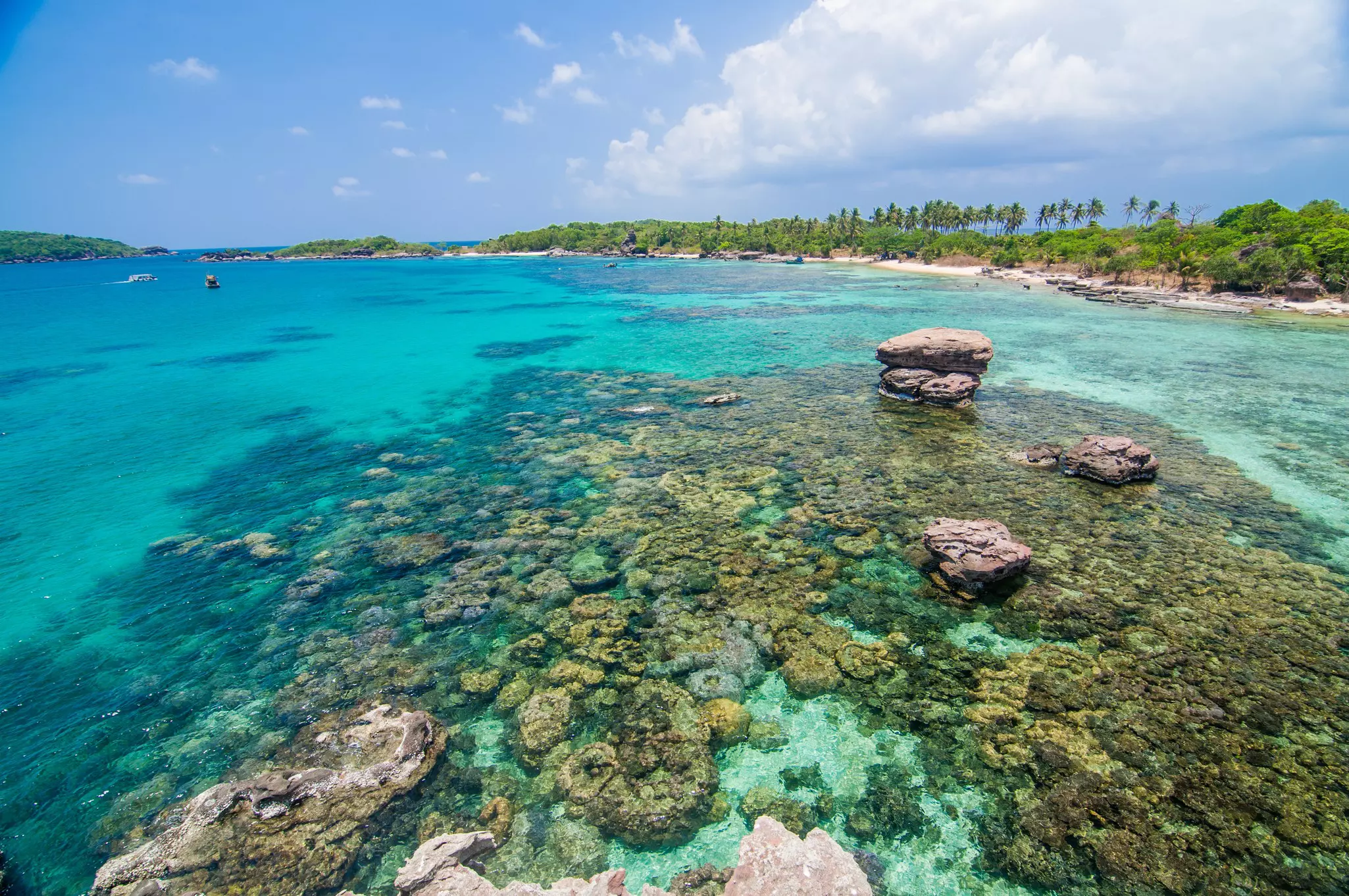 rocks and turquoise waters near an island