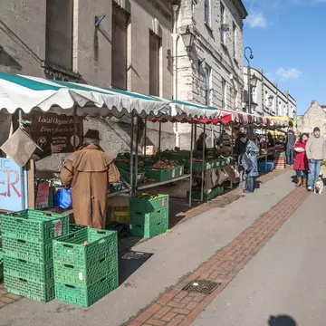 Pedestrians shopping at the busy weekend farmers market in Stroud, the Cotswolds, England, United Kingdom