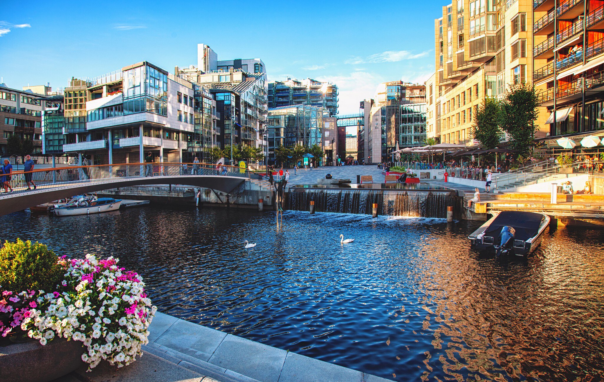 The Oslo Norway Harbor is one of Oslo's great attractions. Situated on the Oslo Fjord in Oslo, Norway.Views of sea and city; Shutterstock ID 1879262575;