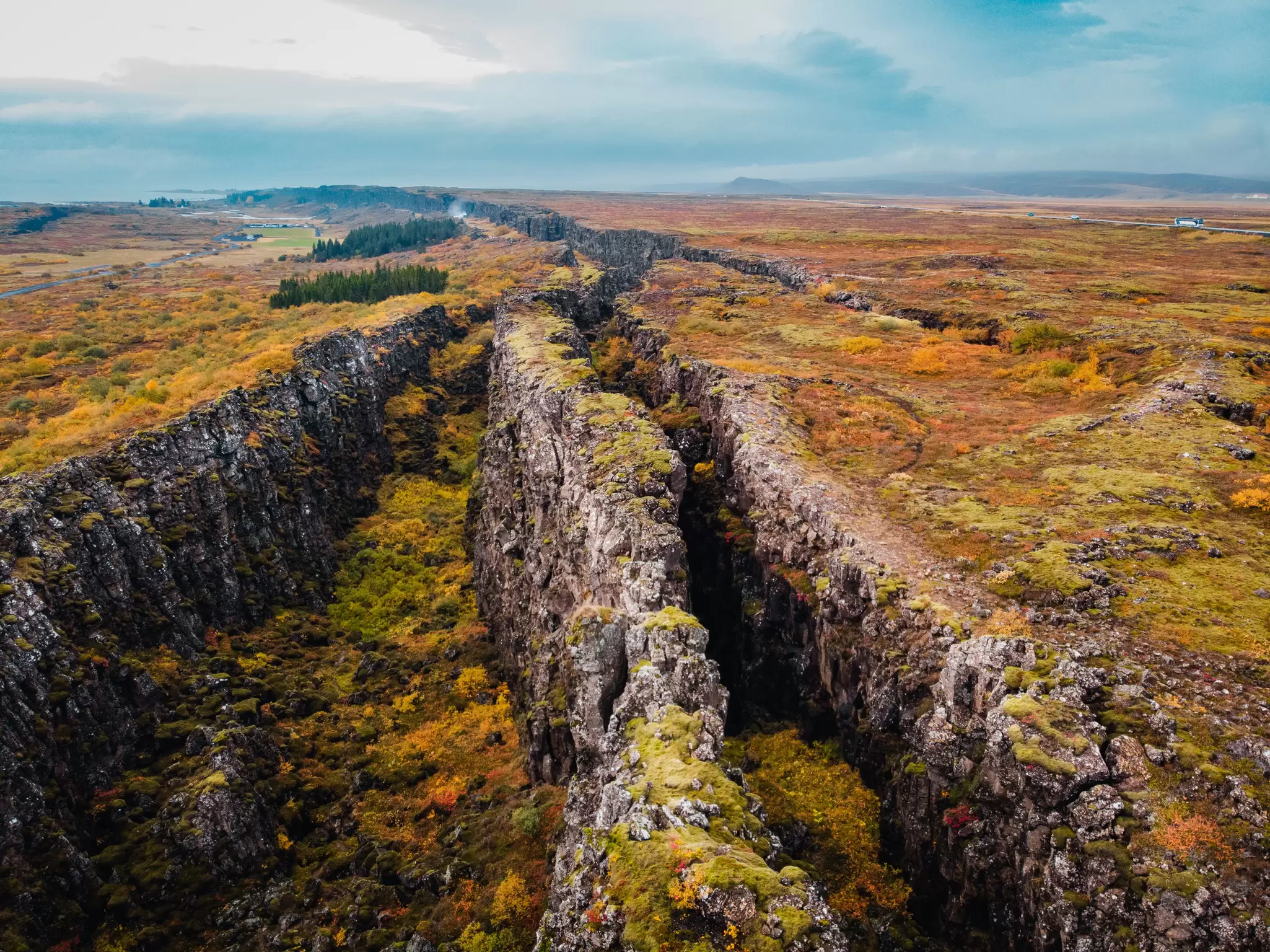 Aerial view over a canyon in Þingvellir National Park during autumn in Iceland.