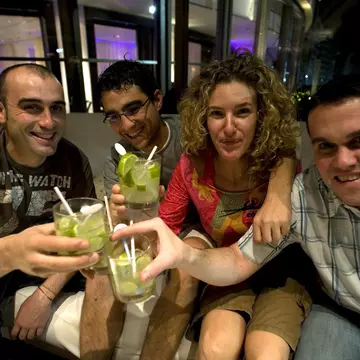 26365-28
Brazil, Rio de Janeiro, South America, adults only, alcohol, arm around, beverage, clubbing, cocktail, compatible, drink, eating out, enjoyment, female, food & drink, food and drink industry, four people, friendship, fun, happiness, horizontal, indoors, leisure activity, lifestyles, looking at camera, male, man, mid adult, mid adult man, mid adult men, mid adult woman, mid adult women, mixed drink, nightlife, one woman, people, portrait, relaxation, restaurant, smiling, spirit, togetherness, woman
Drinking caipirinhas at The Horse's Neck restaurant near posto 6 in Copacabana..