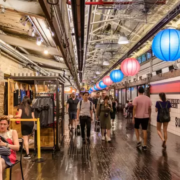 June 12, 2017: Shoppers inside Chelsea Market.
market, hip, halloween, decoration, mall, brick, floor, fun, activity, coins, travel, warehouse, new, urban, landmark, attraction, commercial, light, summer, dollar, people, building, chelsea, season, manhattan, court, holidays, retro, cool, fall, blue, grocery, interior, inside, store, stylish, antique, vintage, background, nature, indoors, shop, food, fashionable, man and woman, people shopping, united states of america, boy and girl, new york city, leadenhall