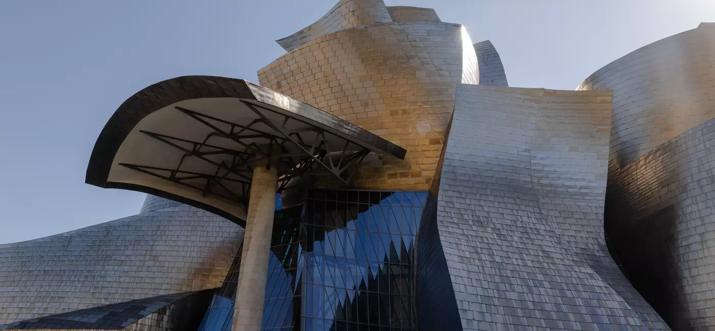 A museum building made of silvery forms.