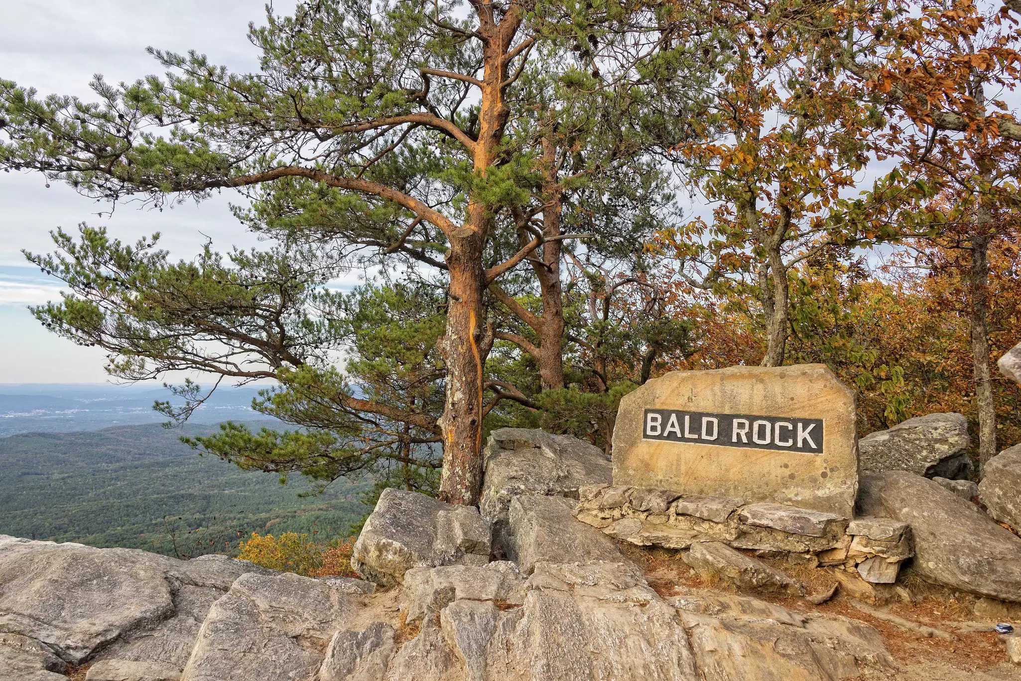 An overlook in a park. A rock off to the right says Bald Rock.