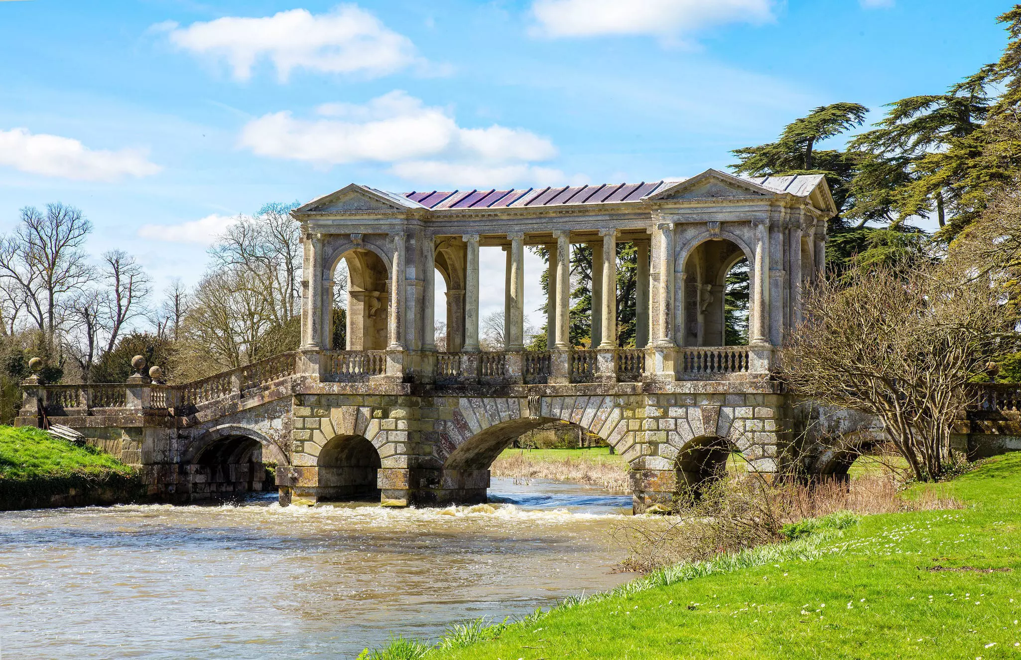 Palladian bridge across the River Nadder on the grounds of Wilton House, Salisbury, England.