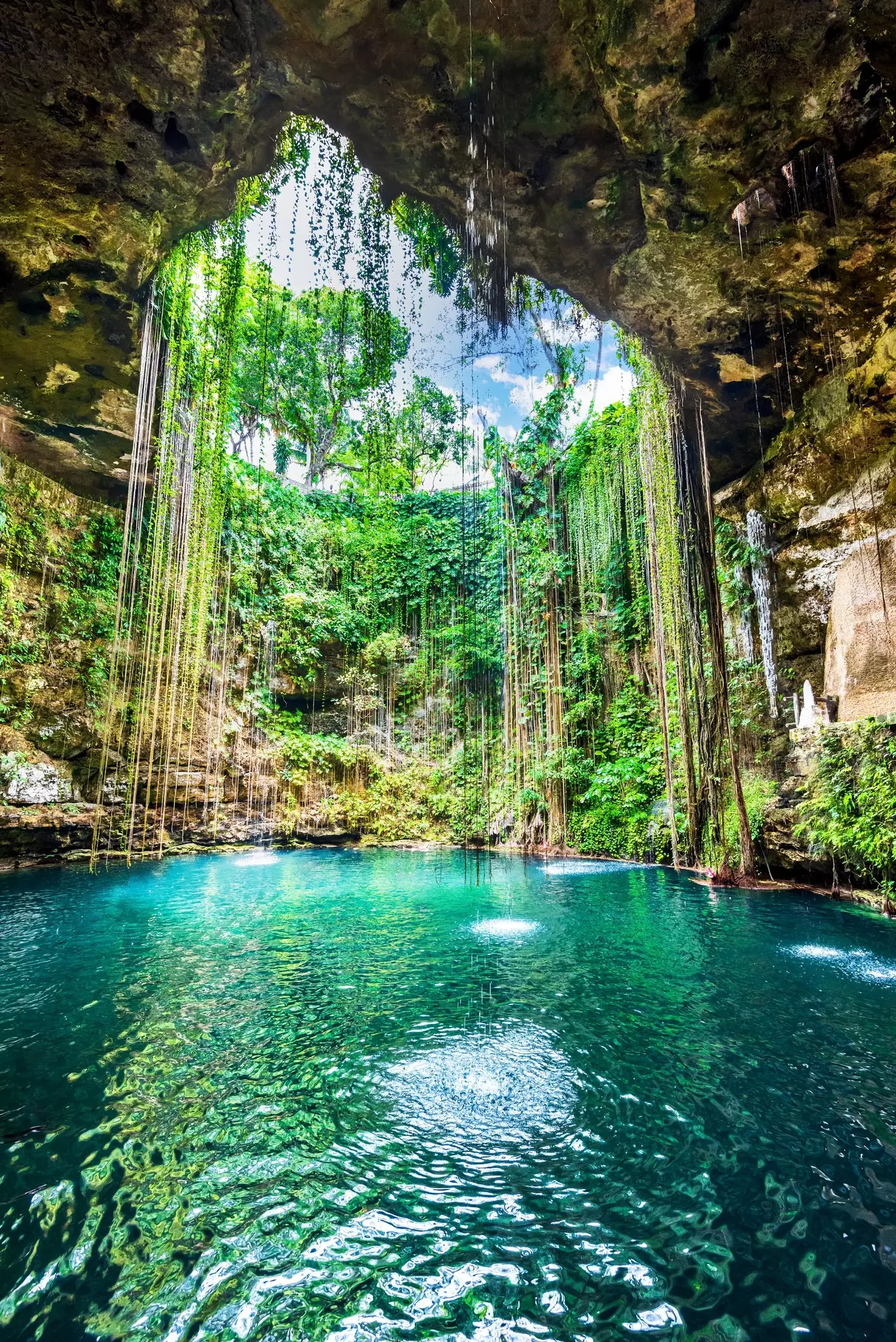 Ik-Kil Cenote, Mexico with vines hanging down