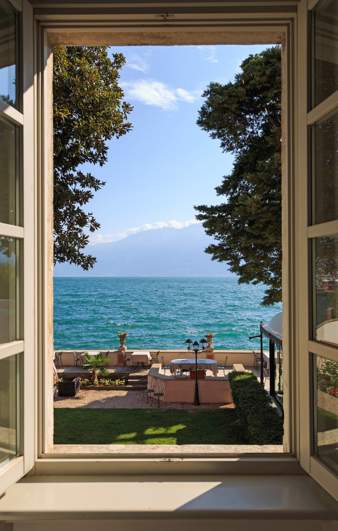 Window view to Lake Como in Italy.
