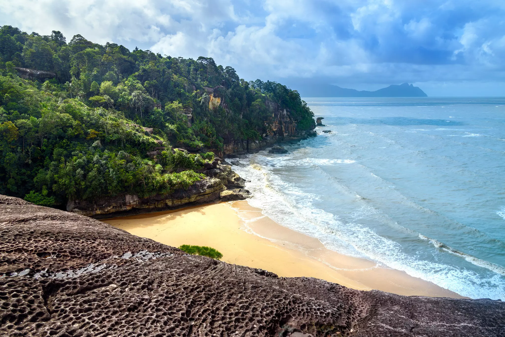 View of the beach from a cliff at Bako National Park