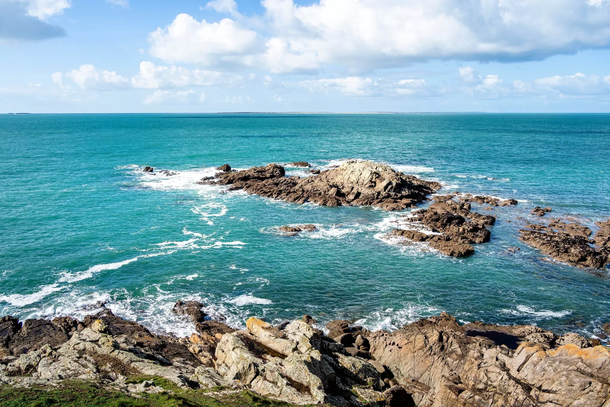 A peaceful view of the water and rocks at Pointe Saint Mathieu, Brittany.