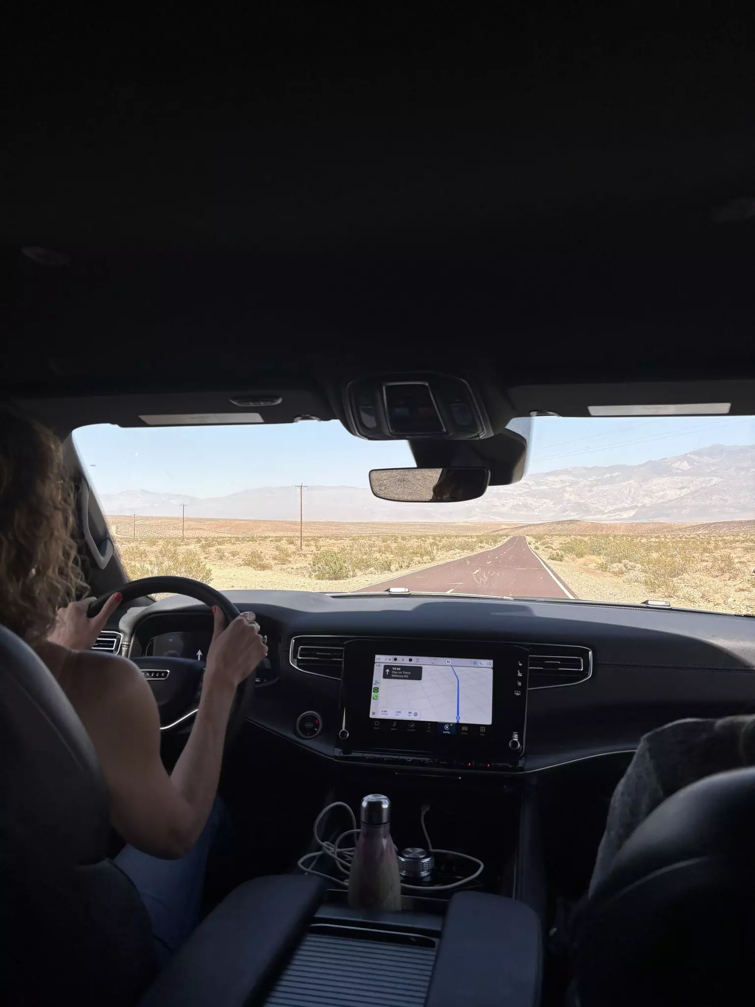 Woman driving through Death Valley