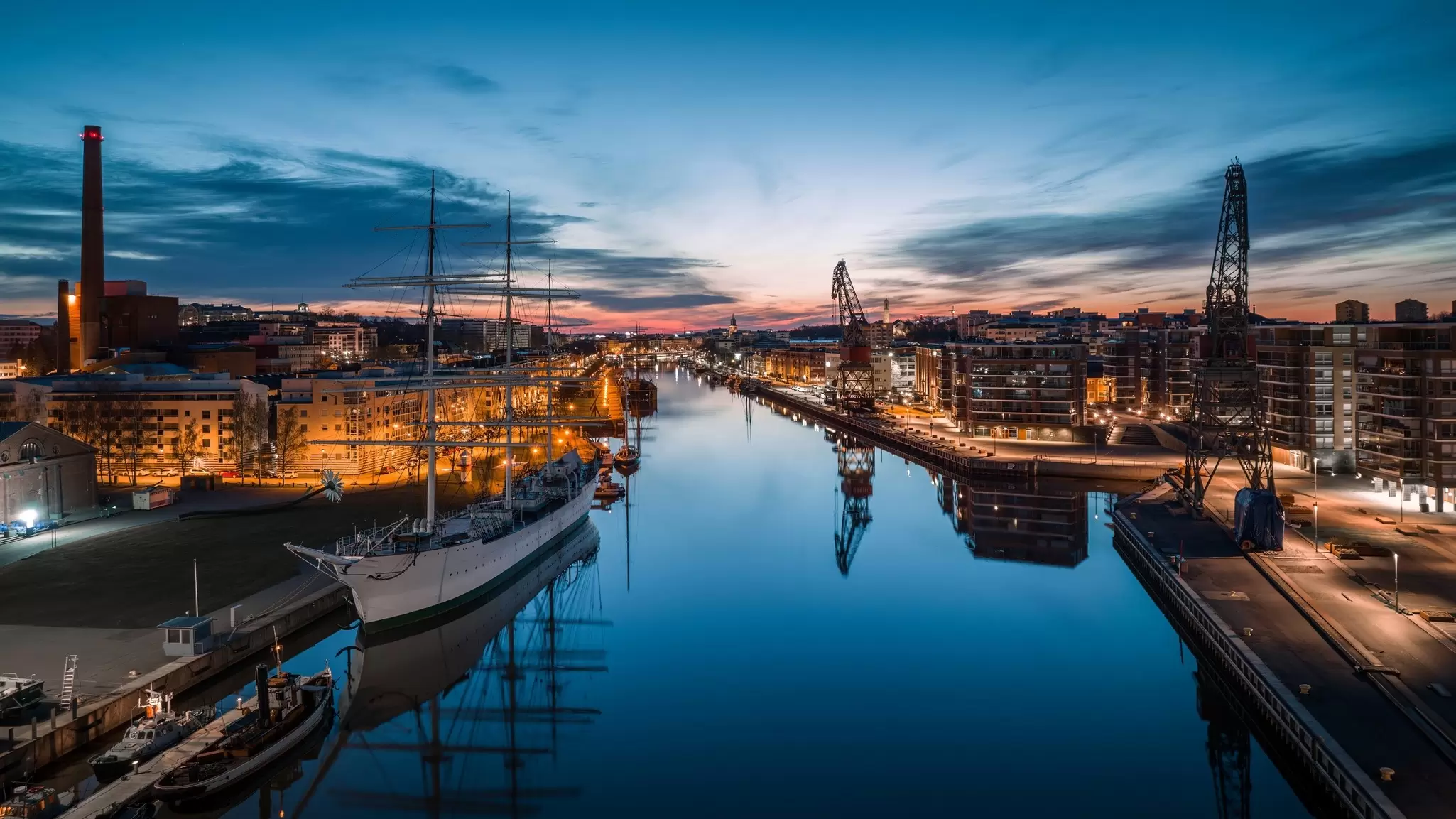 Evening light on the Aura River, Turku, Finland. Jamo Images/Shutterstock