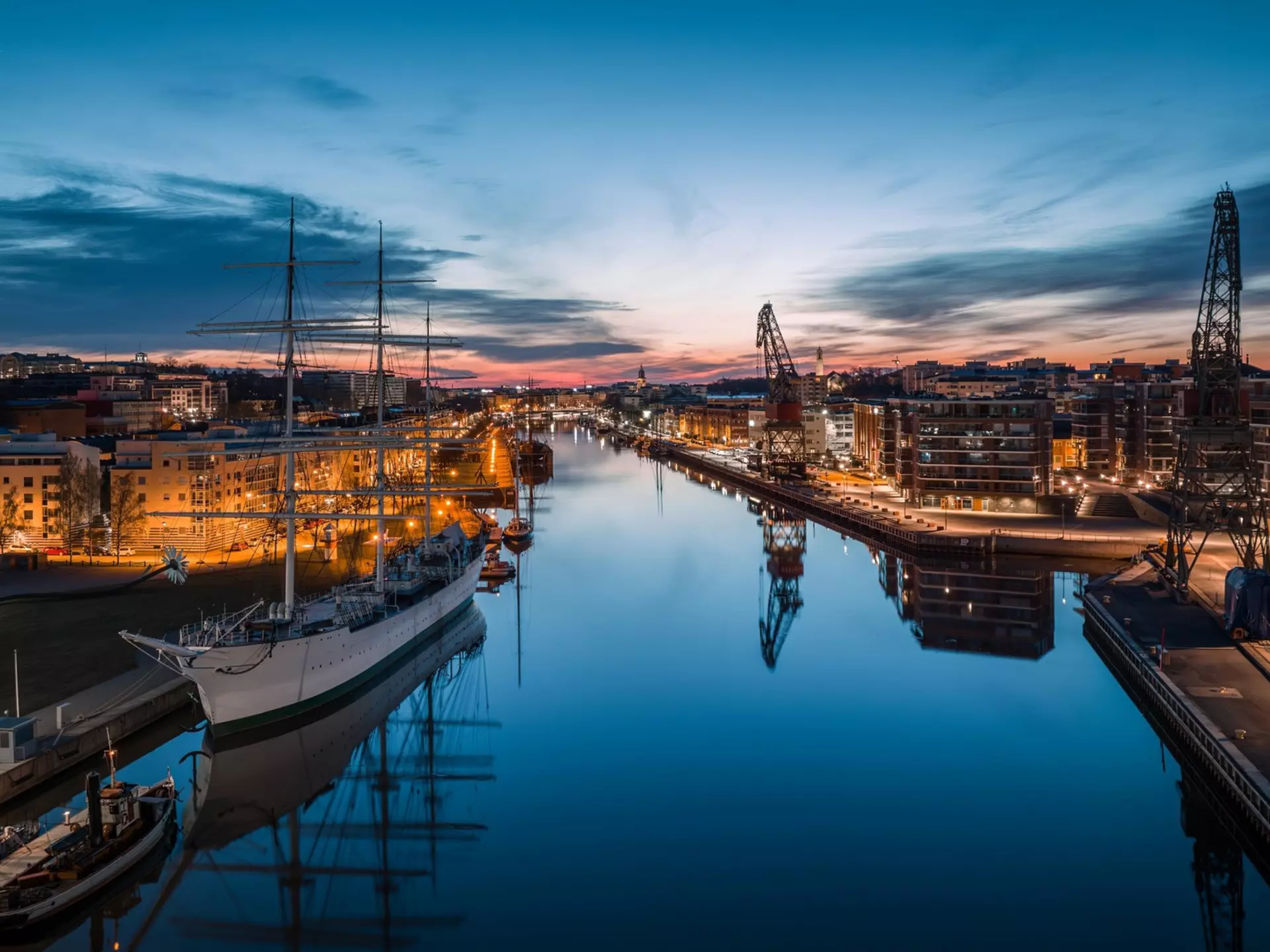 Evening light on the Aura River, Turku, Finland. Jamo Images/Shutterstock