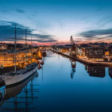 Evening light on the Aura River, Turku, Finland. Jamo Images/Shutterstock