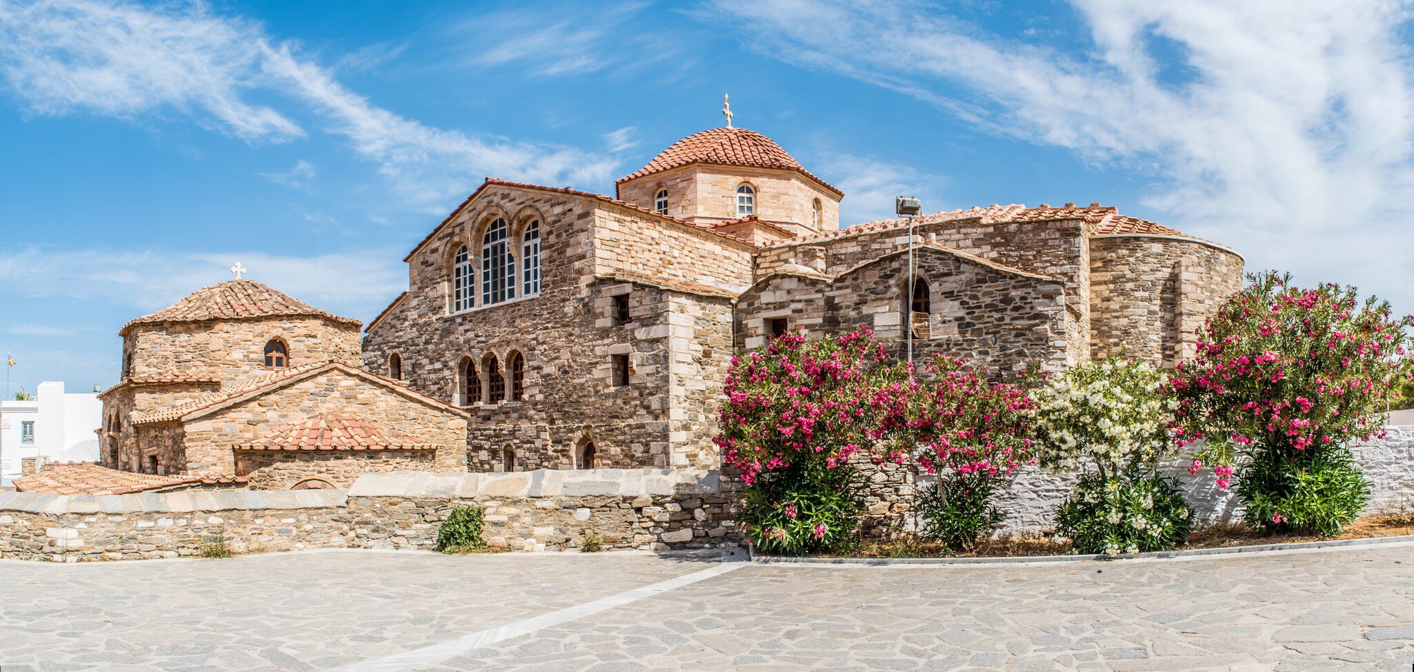 Front entrance of Panagia Ekatontapyliani church also known as the church of doors at the island of Paros in Cyclades, Greece; Shutterstock ID 1135395611; your: Erin Lenczycki; gl: 65050; netsuite: Digital; full: POI
