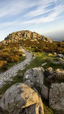 A rock path leading to a rocky peak.