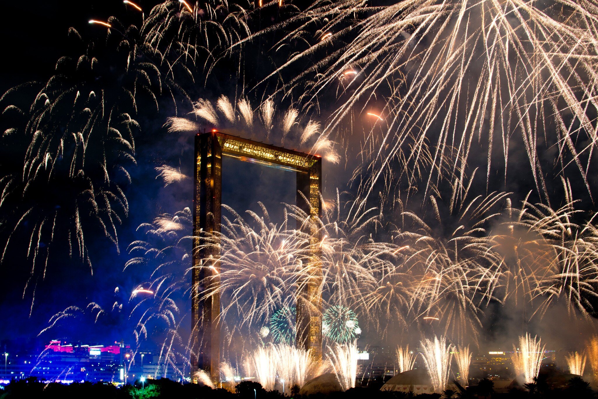 Dubai, United Arab Emirates – January 1, 2025: Fireworks light up the night sky behind the Dubai Frame as crowds celebrate New Year’s Eve in the city., License Type: media, Download Time: 2026-05-21T16:52:25.000Z, User: lonelyplanetmedia, Editorial: true, purchase_order: 65050 - Digital Destinations and Articles, job: Comp Ingestion, client: Global Publishing WIP, other: Pia Peterson