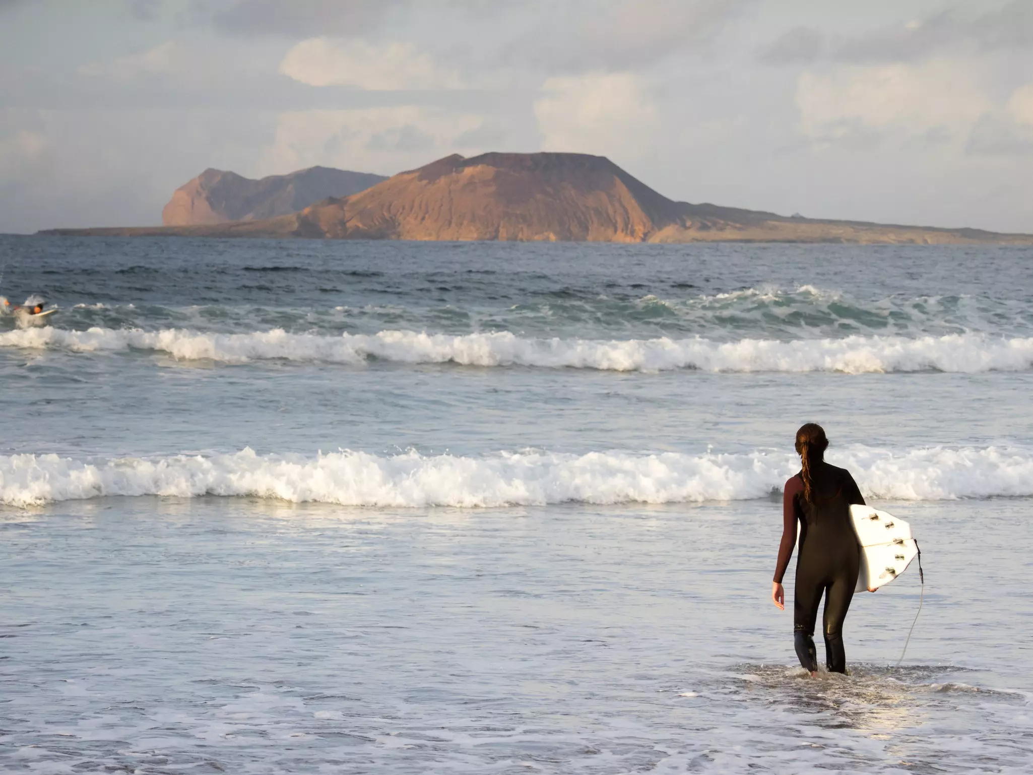 Famara in Lanzarote is one of Europe’s greatest surfing beaches but there are loads of other things to do, too © Jose A. Bernat Bacete / Getty Images
