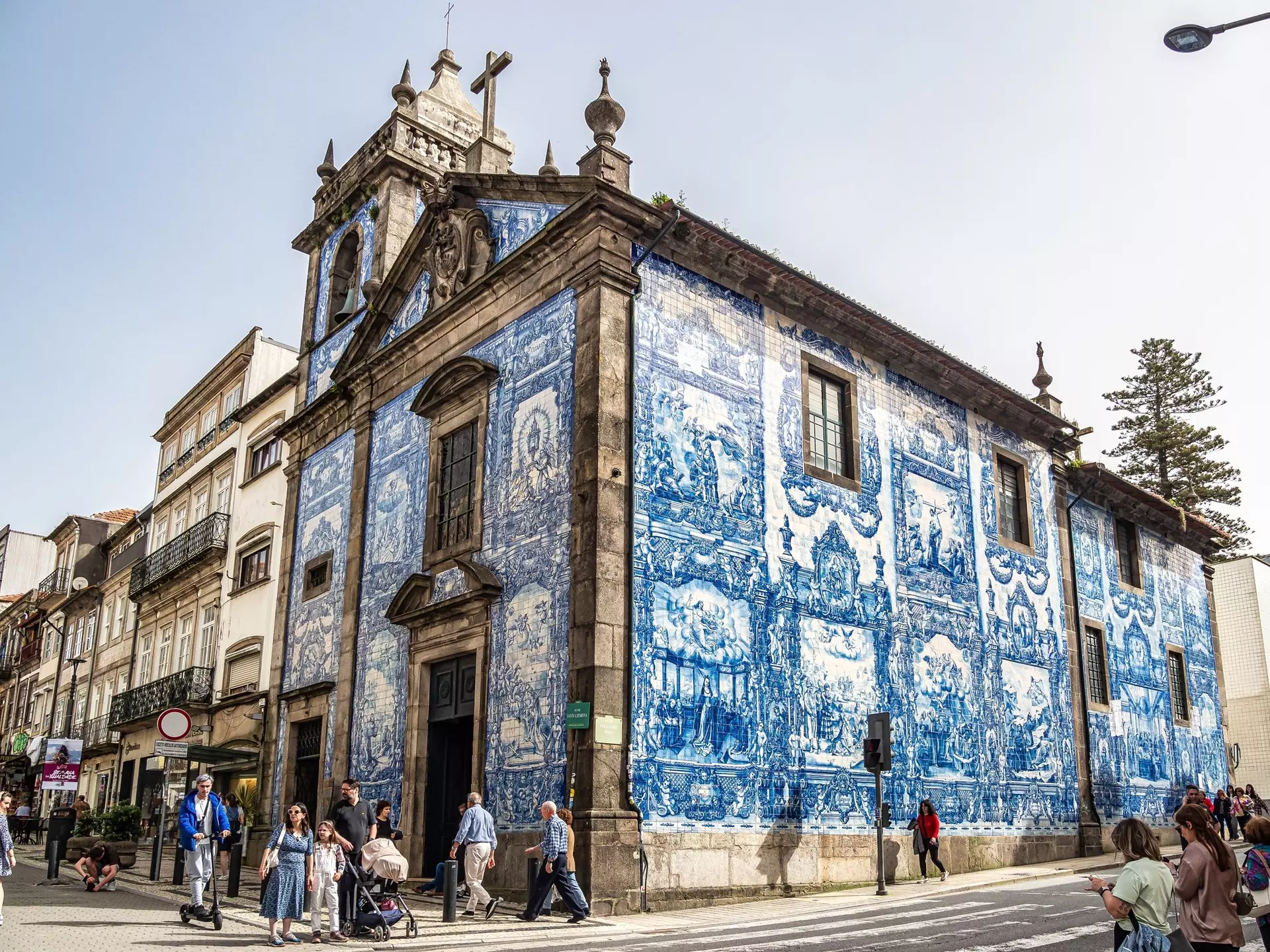 Side view from street of the famous exterior of blue and white tiles painted with scenes from the lives of saints at Chapel of Souls, Capela das Almas de Santa Catarina, Porto
