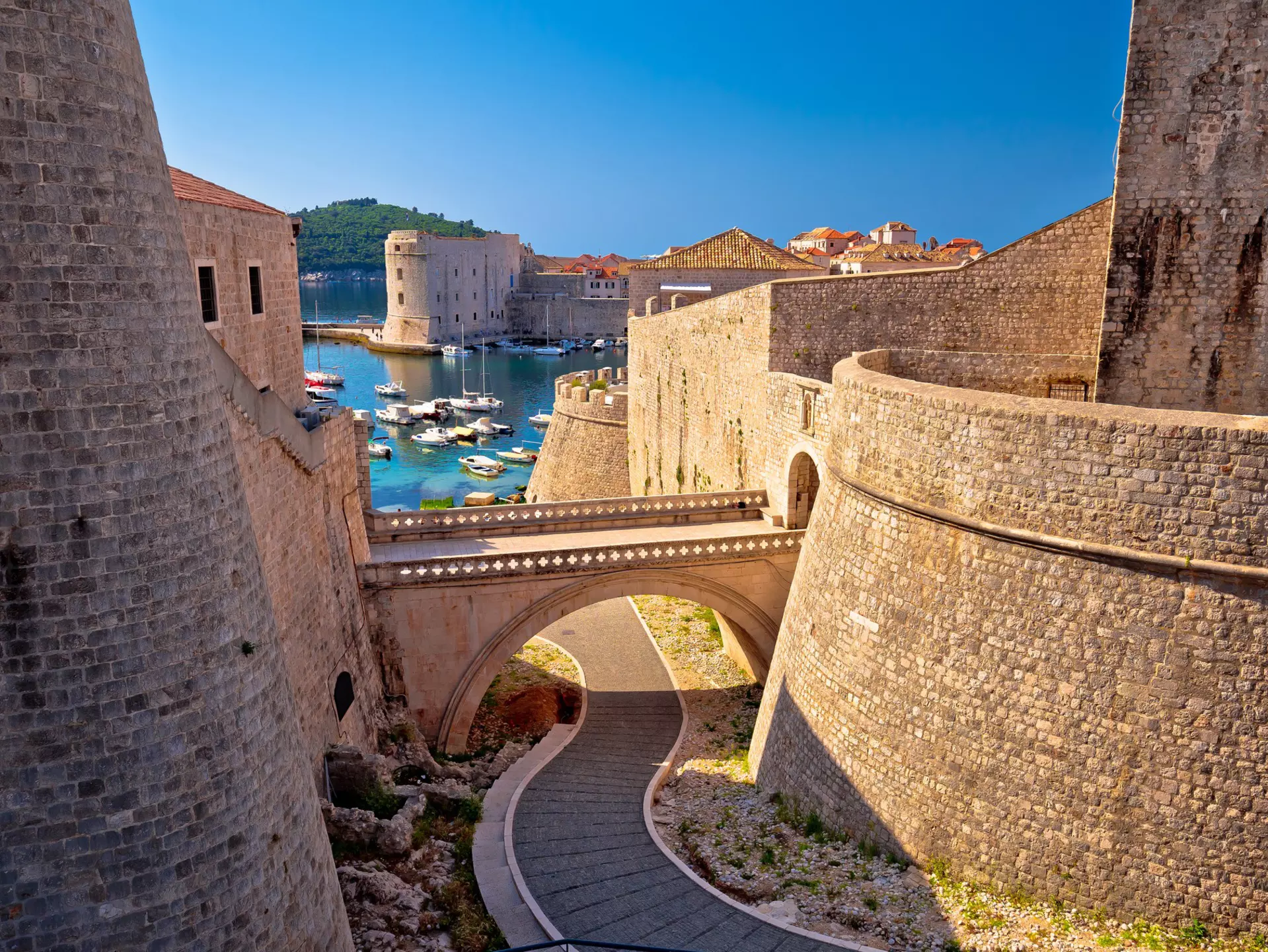 A view over the city walls and harbor in Dubrovnik, Croatia. 