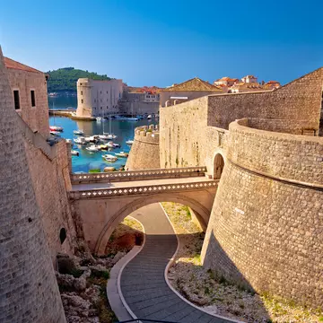 A view over the city walls and harbor in Dubrovnik, Croatia. 