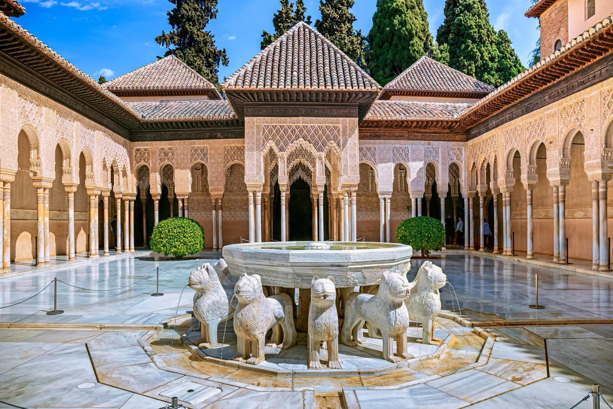 The famous Lion Fountain at the Patio de Los Leones in the Alhambra Palace, Granada, Spain.