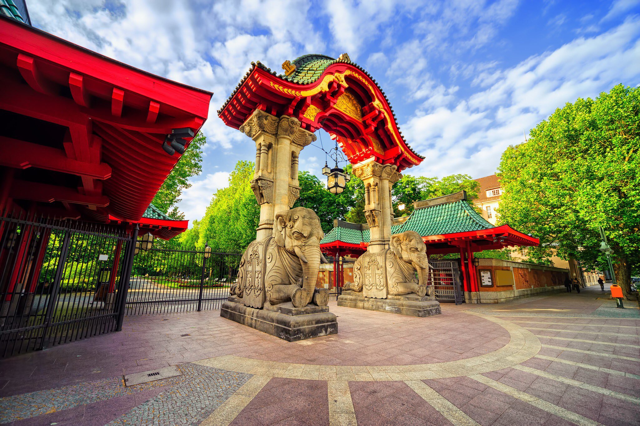 Stone elephants supporting an arched entrance to the Berlin Zoological Garden.
