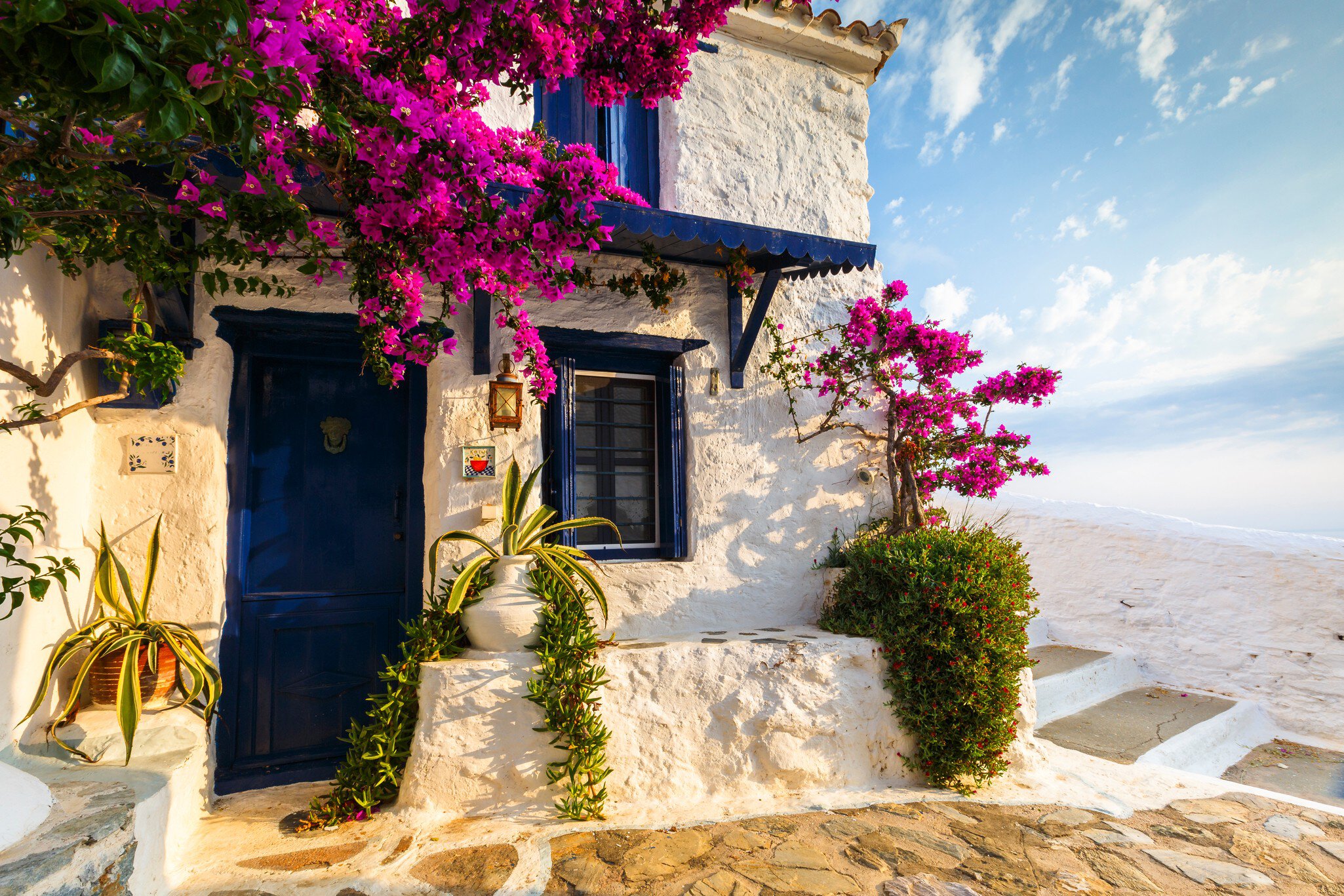 Skopelos, Greece - June 15, 2017: Facade of an old building in Skopelos town, Greece."n