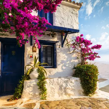Skopelos, Greece - June 15, 2017: Facade of an old building in Skopelos town, Greece."n