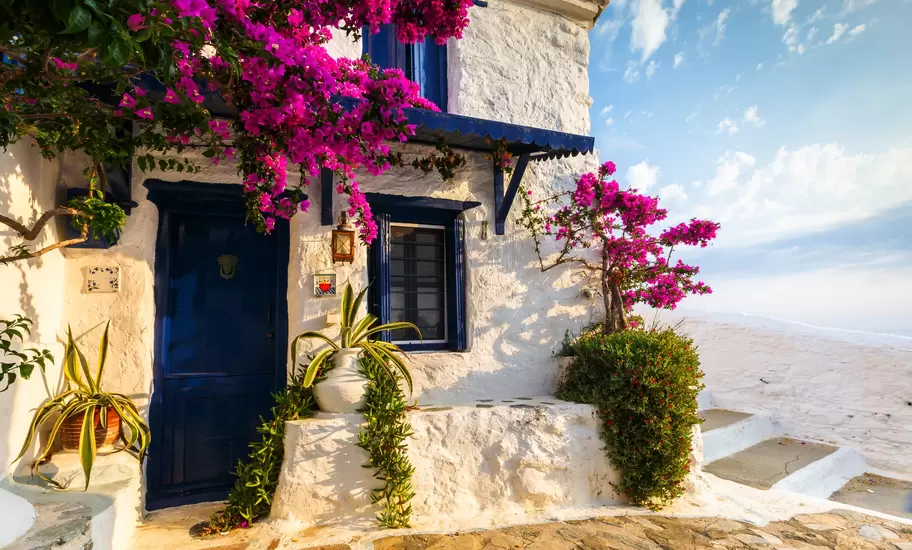 Skopelos, Greece - June 15, 2017: Facade of an old building in Skopelos town, Greece."n