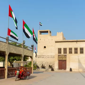 'Ras al Khaimah, RAK/United Arab Emirates - 09/28/2018 - Entrance of the Ras al Khaimah Museum in the morning sun with flags blowing.', License Type: media, Download Time: 2026-07-09T23:30:01.000Z, User: dermothegarty77, Editorial: true, purchase_order: 56530 - Guidebooks, job: Global Publishing WIP, client: Oman, UAE & Arabian Peninsula, other: Dermot Hegarty