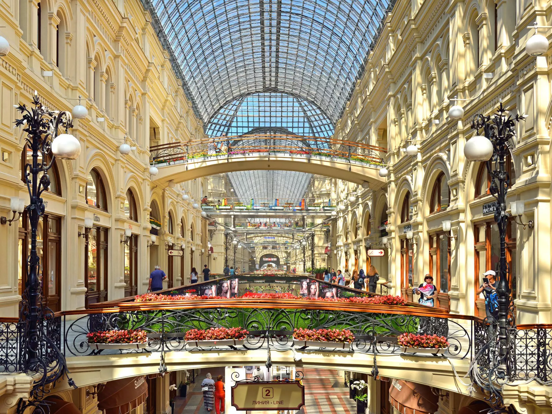 While shopping in GUM department store be sure to check out its famous glass roof. Popova Valeriya / Shutterstock