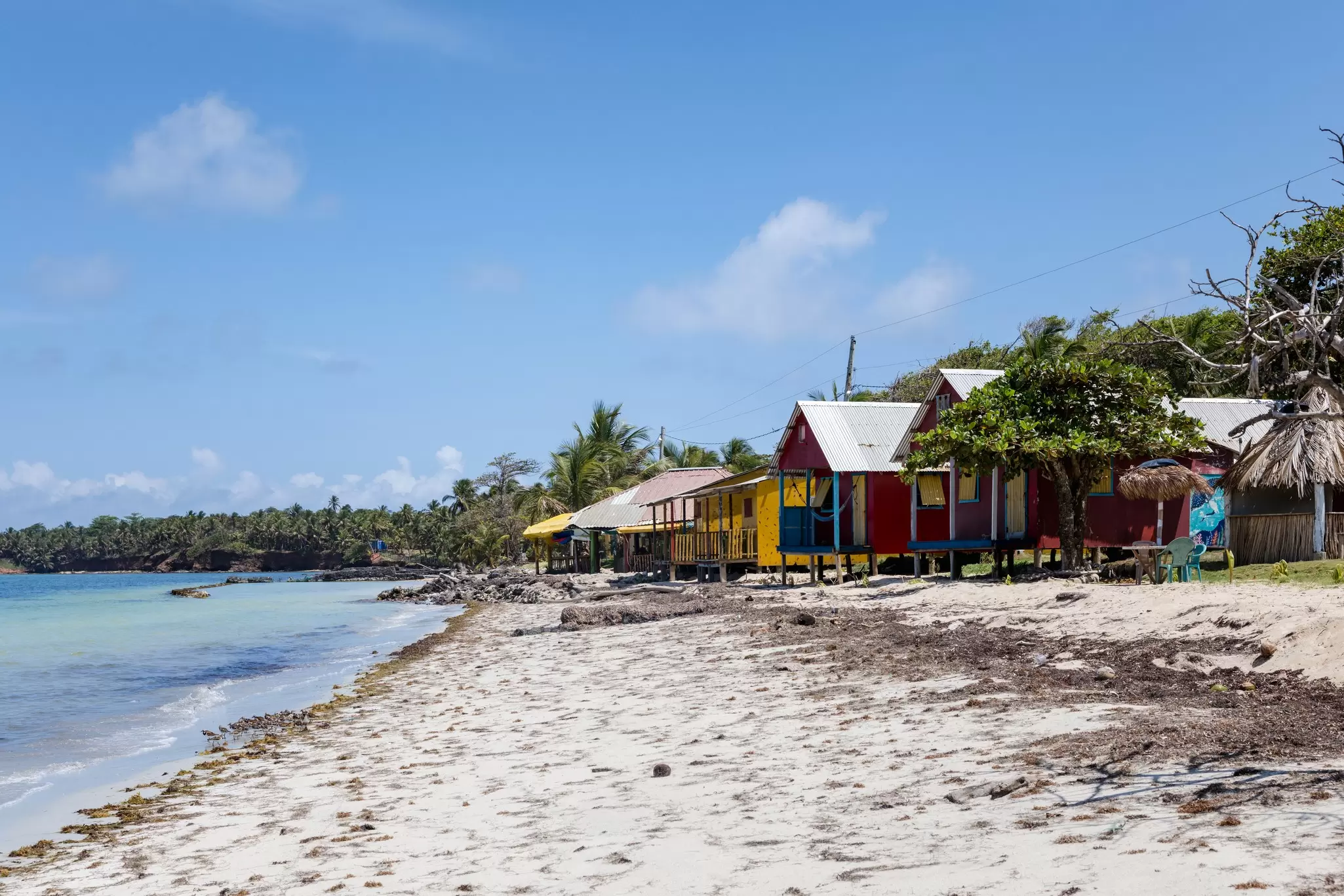 Colorful houses line the beach at Little Corn Island, Nicaragua. Michael George for Lonely Planet