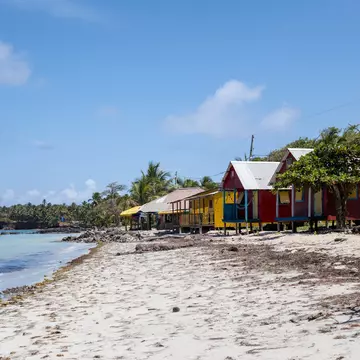 Colorful houses line the beach at Little Corn Island, Nicaragua. Michael George for Lonely Planet