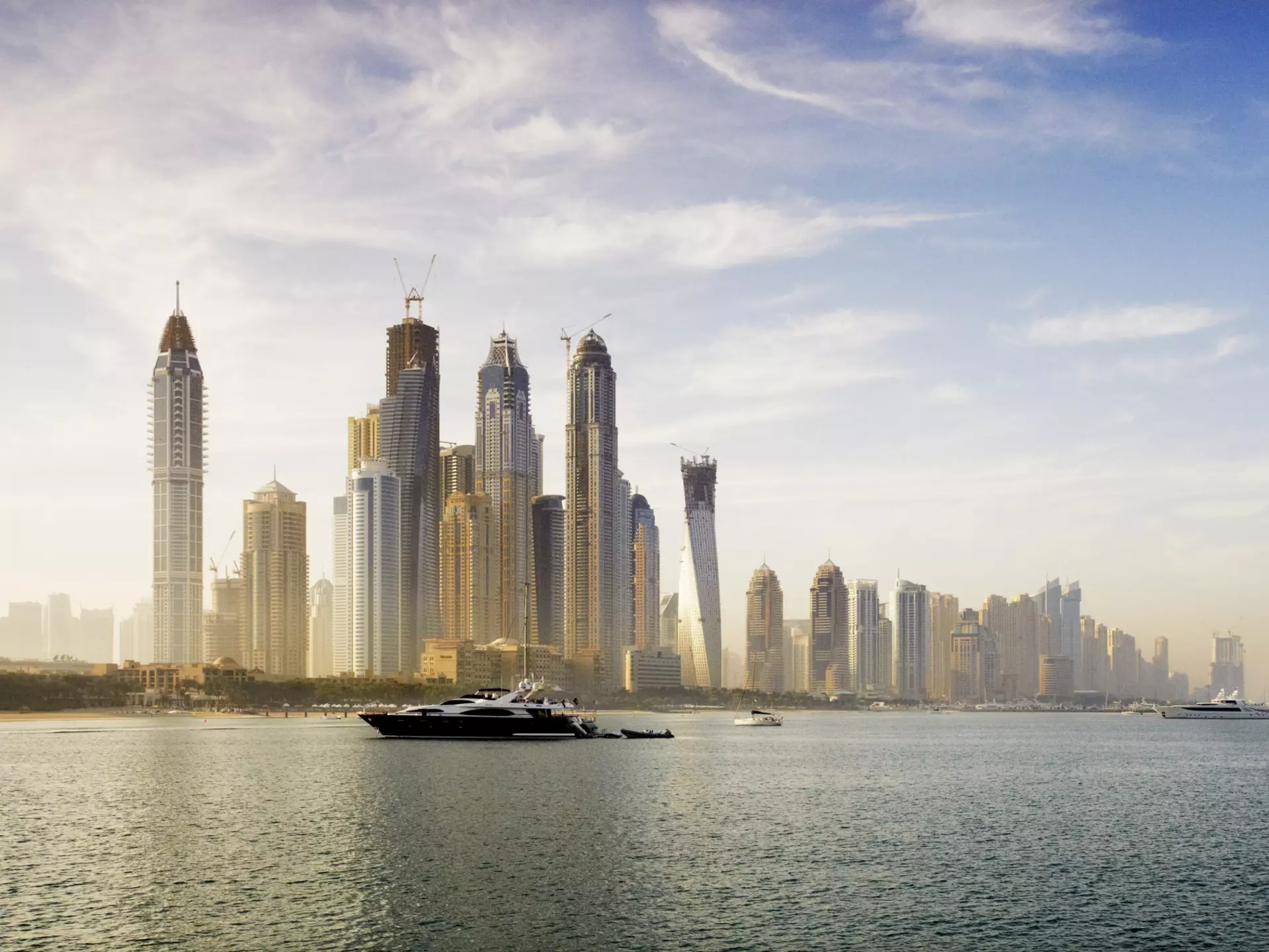 Skyscraper buildings on waterfront.
Lonely Planet Traveller Magazine, Issue 38, Dubai, Changing Tides