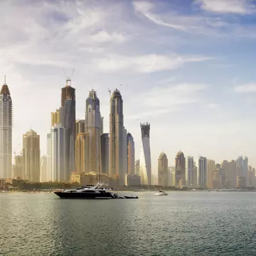 Skyscraper buildings on waterfront.
Lonely Planet Traveller Magazine, Issue 38, Dubai, Changing Tides