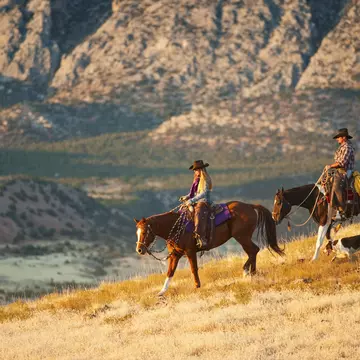 From cattle drives to cowboy cookouts, these destinations will make your ranch-hand dreams a reality. Tetra Images/Getty Images