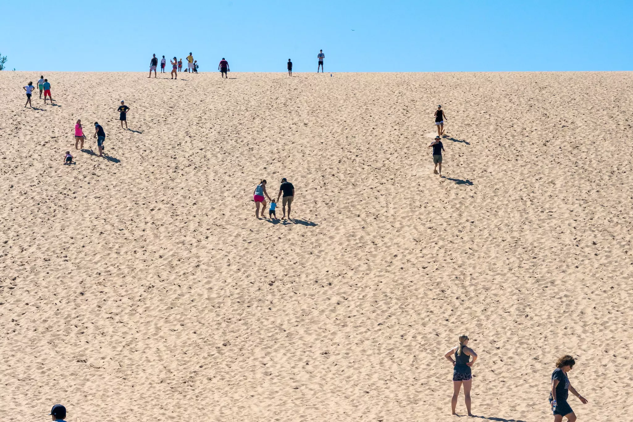 Kids of all ages will love to run or barrel-roll down the dramatic dunes at Sleeping Bear © KLiK Photography / Shutterstock