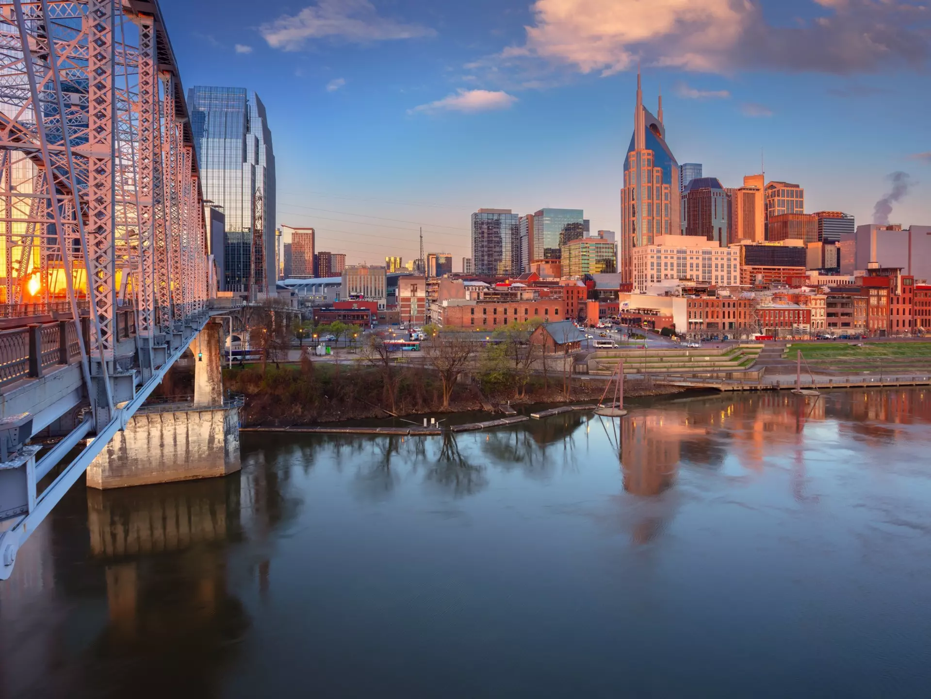 Nashville’s skyline next to the Cumberland River at sunrise. Rudy Balasko/Shutterstock