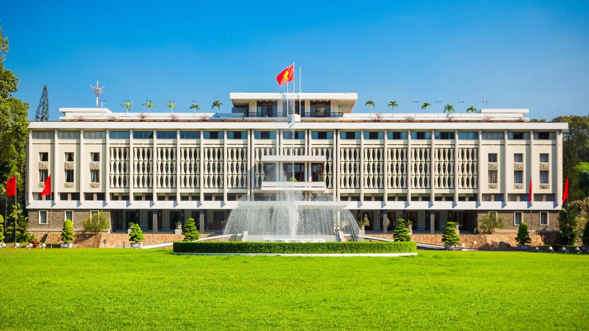 Fountain with Reunification Palace in the background in Ho Chi Minh City in Vietnam