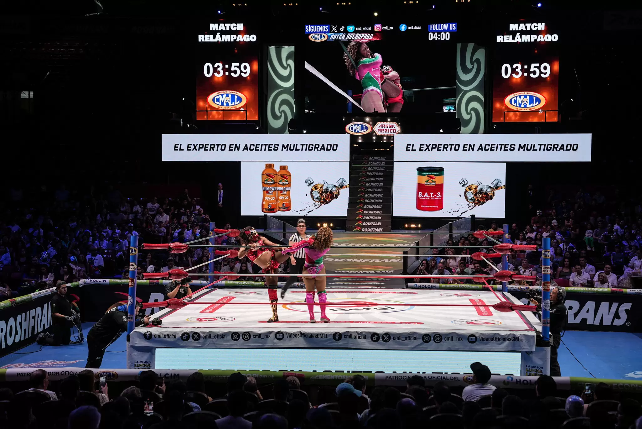 View of wrestlers at a Lucha Libre match at Arena México in Mexico City.