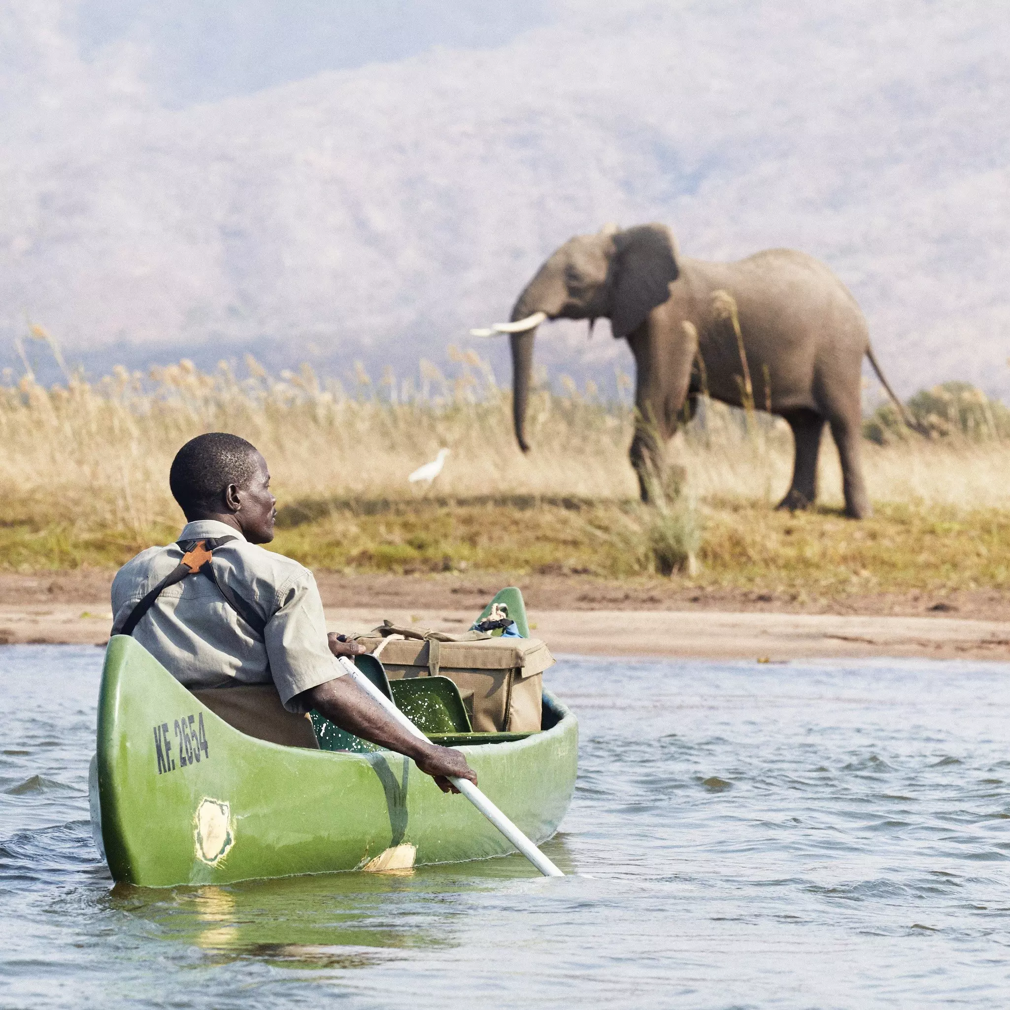 Safaris on the banks of the Zambezi (on the border of Zimbabwe and Zambia) involve canoes for elephant watching © Jonathan Gregson / Lonely Planet