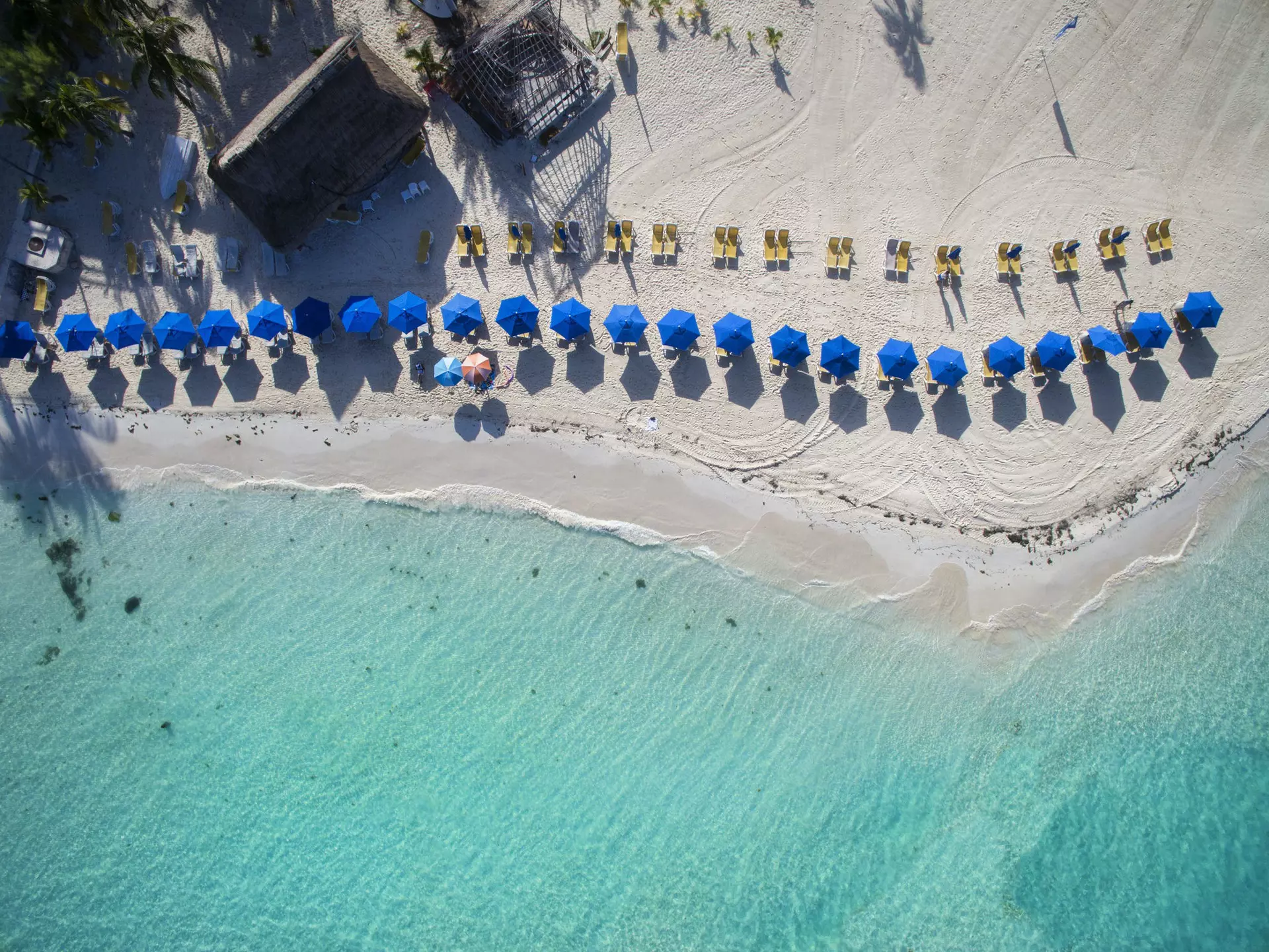 865927772
Beach; Blue; Cancun; Horizontal; Isla Mujeres; Island; Latin America; Mexico; No People; Outdoors; Photography; Sand; Shore; Turquoise; Turquoise Colored; Water;
Beach umbrellas line the beach of Isla Mujeres, Aerial view