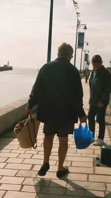 A person carrying home the market goods.