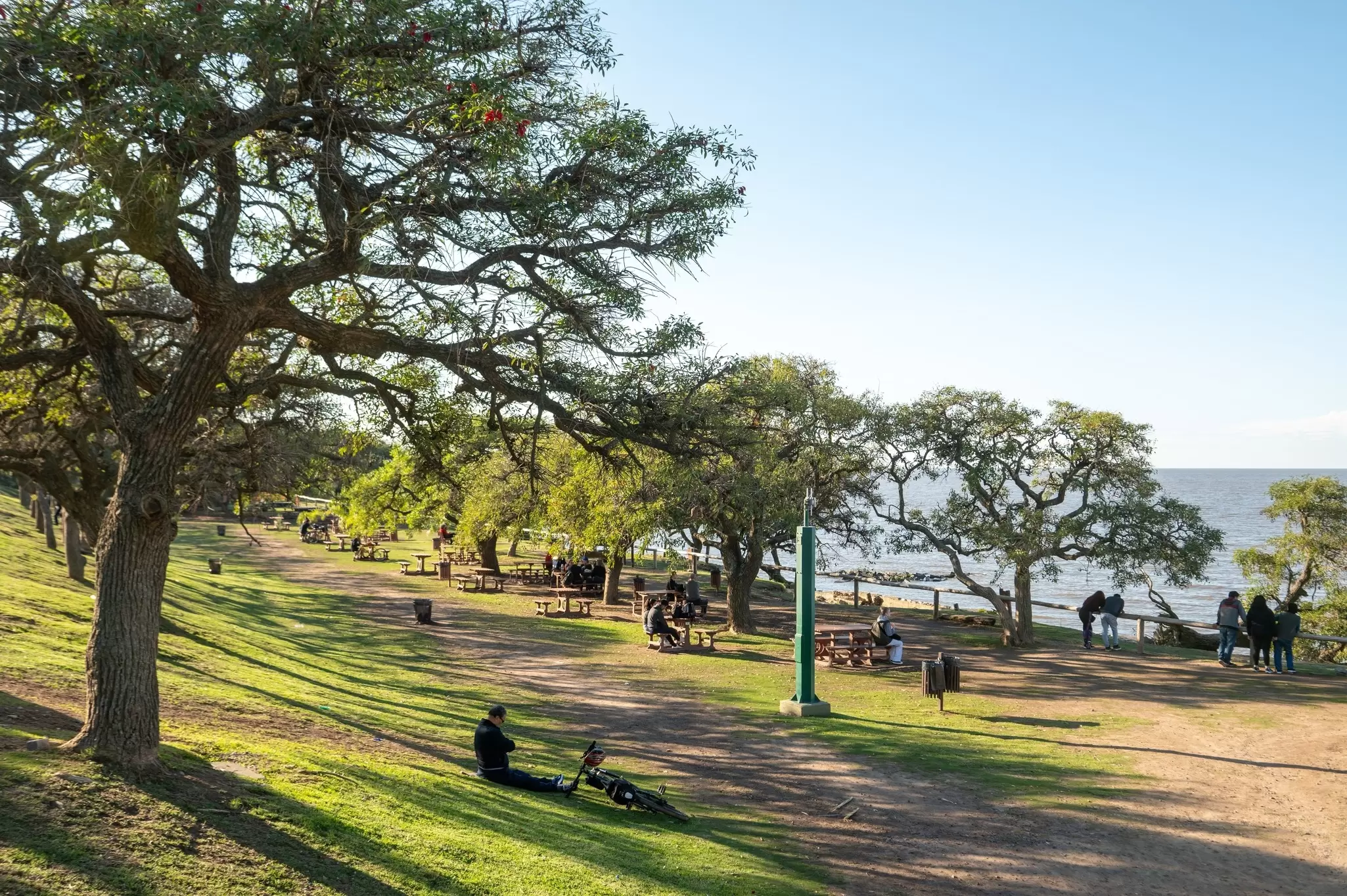 People enjoying a sunny day in the Reserva Ecológica Costanera Sur in Buenos Aires, Argentina.