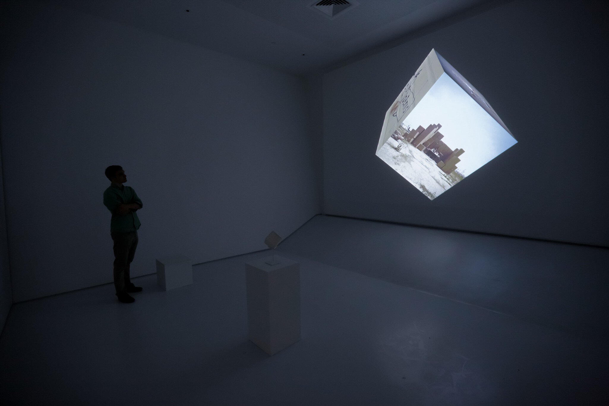 NEW YORK, NY - APRIL 14:  A preview attendee explores an interactive film exhibit entitled "Google Cube-Untitled" during the Sensory Stories Press Preview held at the Museum of the Moving Image on April 14, 2015 in New York City.  (Photo by Brent ...